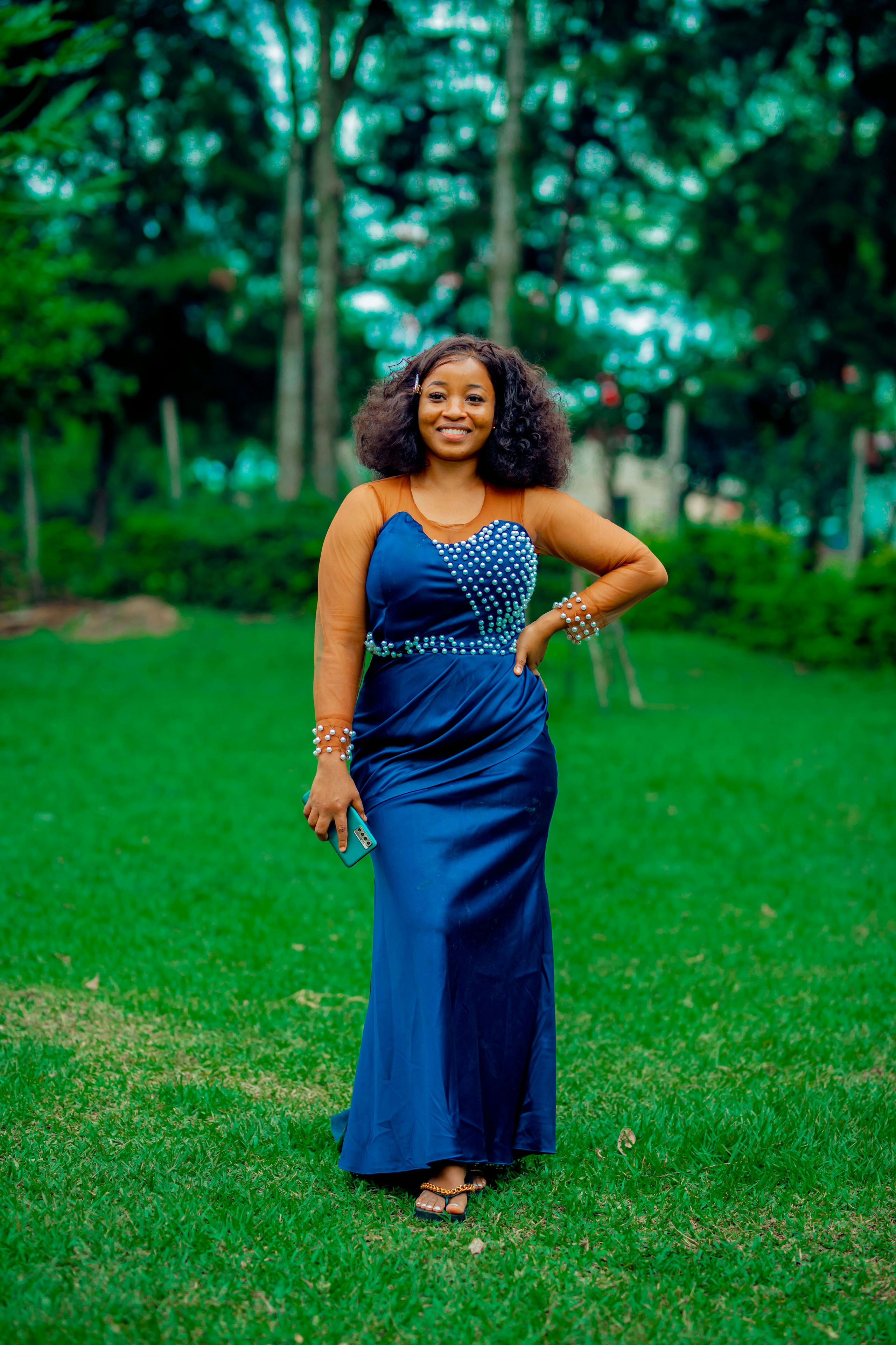 Elegantly dressed woman in blue at a Cheltenham Festival race day